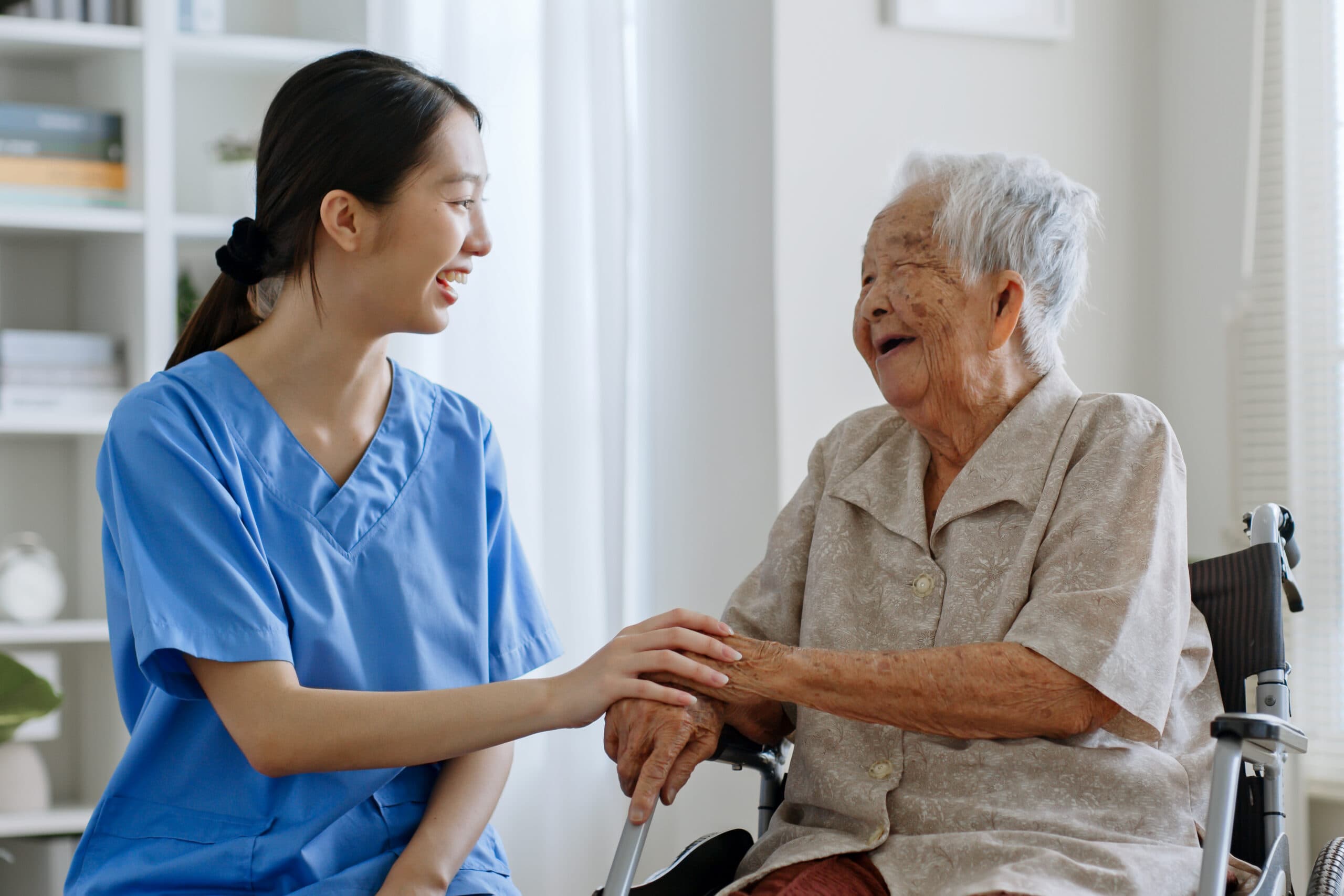 Caregiver providing friendly support at home