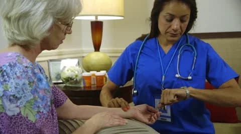 Physical therapist providing compassionate care to a patient